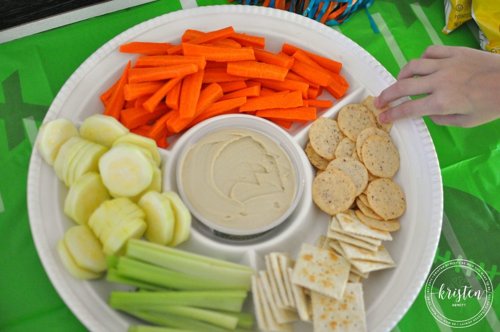 Looking to feed a crowd but still eat clean? Try these 10 healthy football snacks and check out these cute game day party ideas!