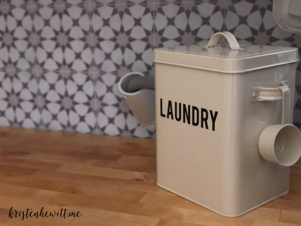 Looking for a simple and budget friendly way to reorganize your laundry room? Here's a DIY laundry room makeover you can do in a weekend!